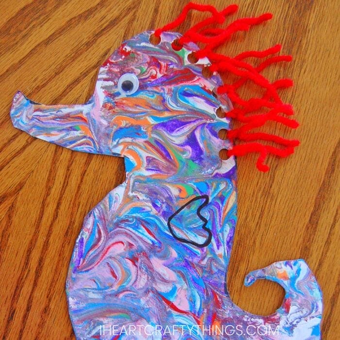 Create your own Mister Seahorse Craft using this creative shaving cream marbled painting technique. This ocean themed art project is the perfect companion to Eric Carle’s book!